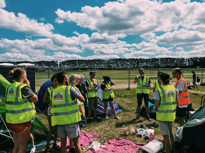 A photo of the Festovers team wearing high vis jackets