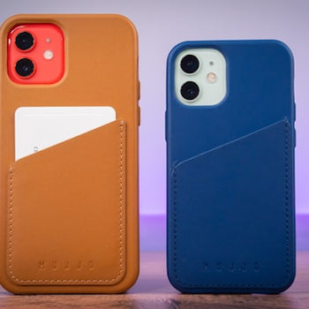 Two phones in different coloured cases