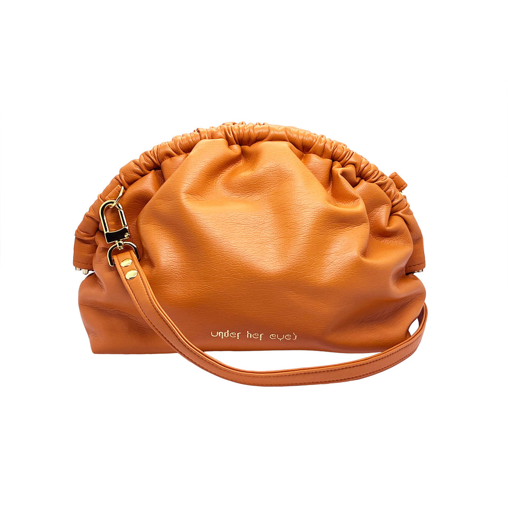 Under Her Eyes Norma Large Clutch, Shoulder & Cross Body Bag in Vintage Orange