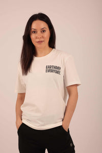 A model wearing a white t-shirt with 'EARTHDAY EVERYDAY.' printed in the top right 