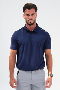 Man wearing medieval navy blue polo T-shirt with grey trousers and a black belt