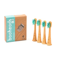 4 bamboo brush heads with green bristles with cardboard packaging